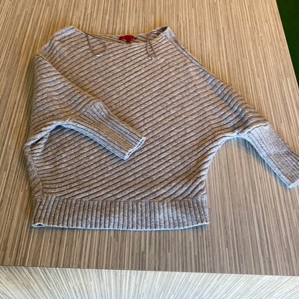Women’s medium Jennifer Lopez sweater.